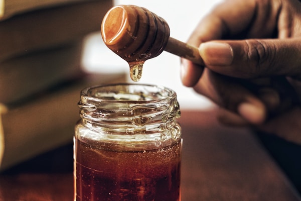 Golden honeycomb dripping with fresh honey