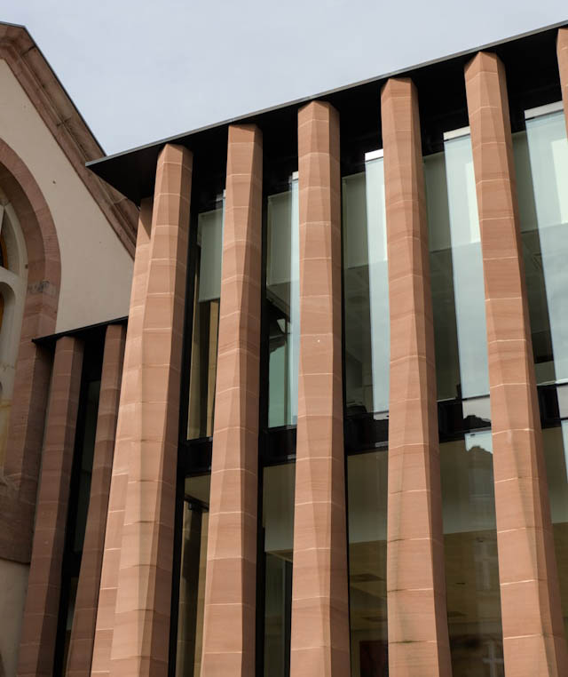 Modern building with sandstone columns