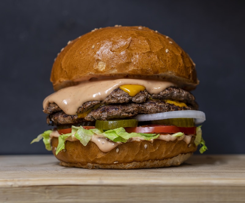 Stacked juicy burger with toppings